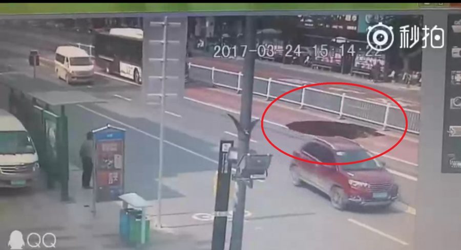 Chinese Bus Driver Narrowly Avoids Being Swallowed By Surprise Sinkhole