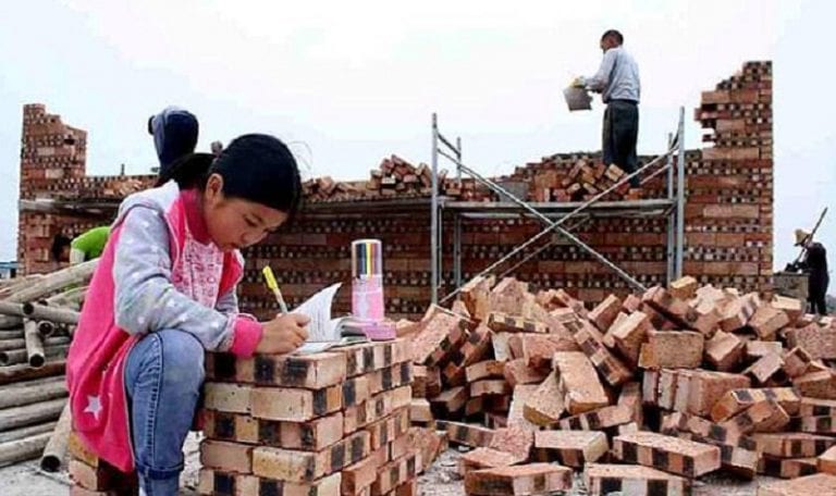 Chinese Girl Who Does Her Homework on A Pile of Bricks Proves the Struggle is Real