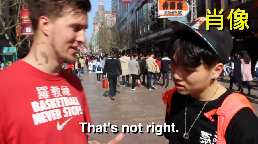 Foreigner Schools Chinese People in Mandarin on the Streets of Shanghai