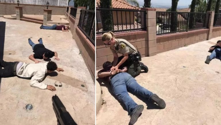 Asian American Man Holds Intruders at Gunpoint While Taking Cell Phone Pics