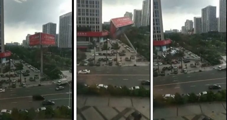 Giant Billboard Crushes Parked Cars in Downtown Dongguan, China