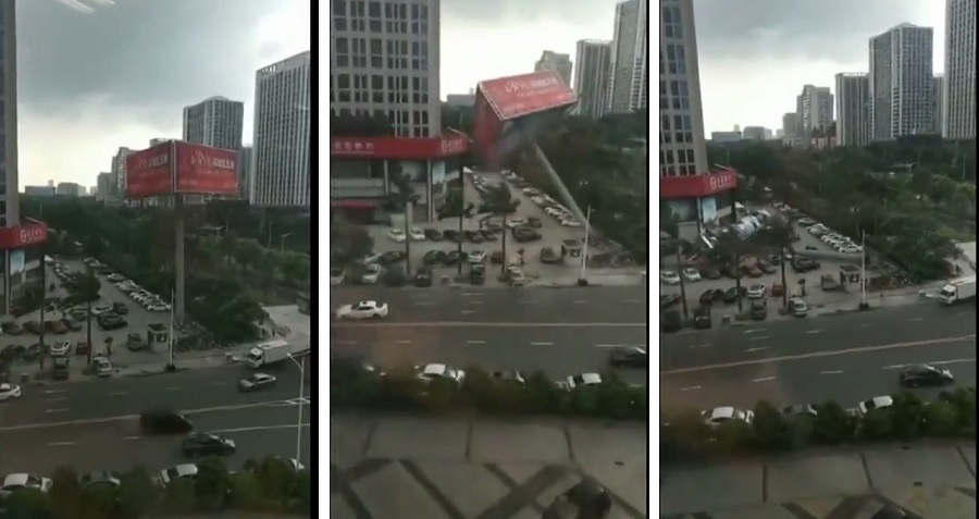 Giant Billboard Crushes Parked Cars in Downtown Dongguan, China