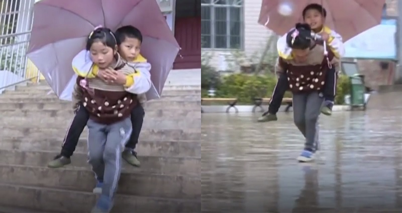 She Carries Her Disabled Brother to School Everyday on Her Back