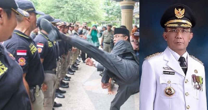 indonesian politician kicks local cops in the chest