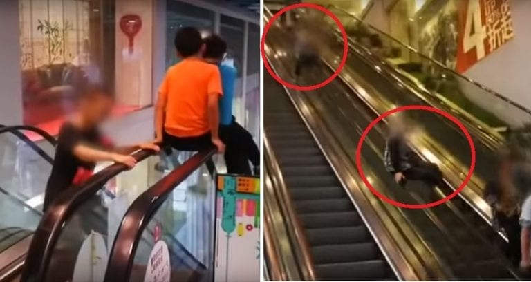 Adults Cheer as ‘Daredevil’ Kids Slide Down Handrails of Long Escalator in Chinese Mall