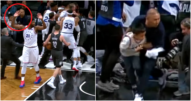 ‘Dad of the Year’ Protects Son During Fight at NBA Game