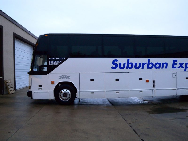 Suburban Express has coughed up a six-figure payment in a legal battle that stemmed from an email advertisement in which they mocked Chinese students.