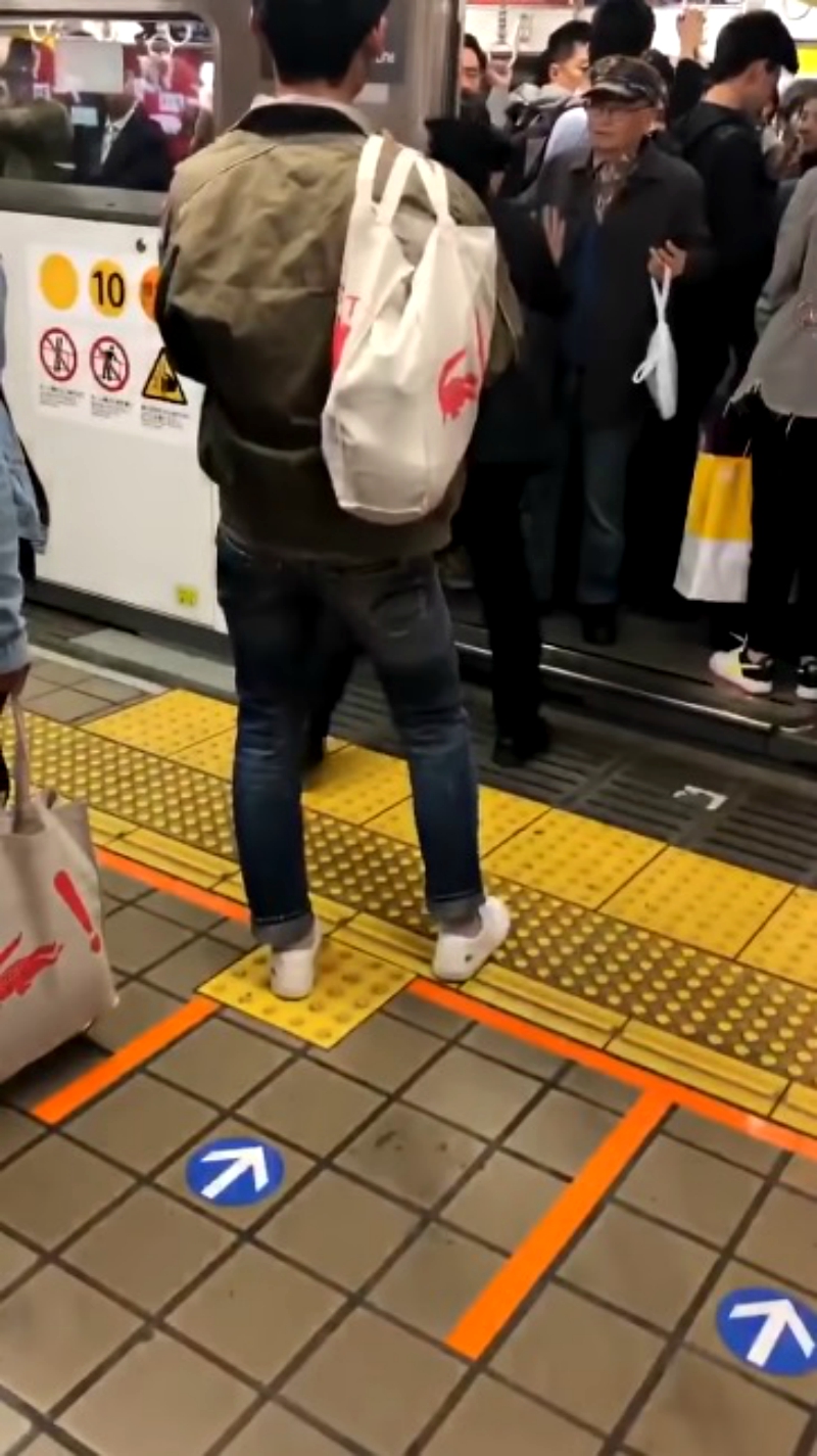 An elderly Japanese commuter who managed to stop a train has gone viral on social media.