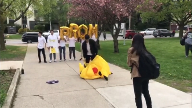 Sometimes simply going up to someone and asking them out to prom isn't extravagant enough which is why this student chose to ask a girl out in public while wearing a massive Pikachu costume.