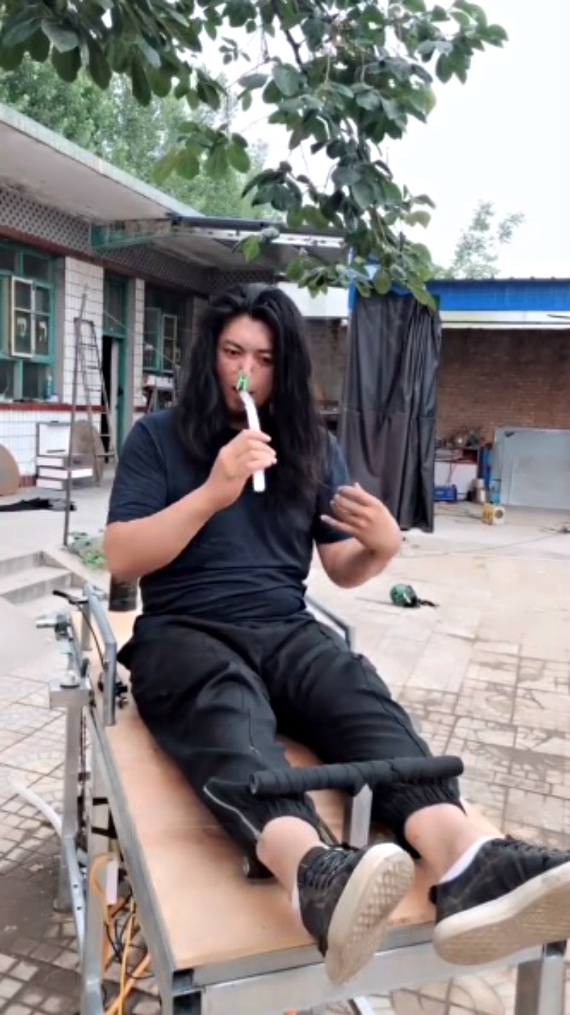 An inventor in China has gone viral on social media after creating a hair washing machine that forces users to go upside down if they actually want to see it work.
