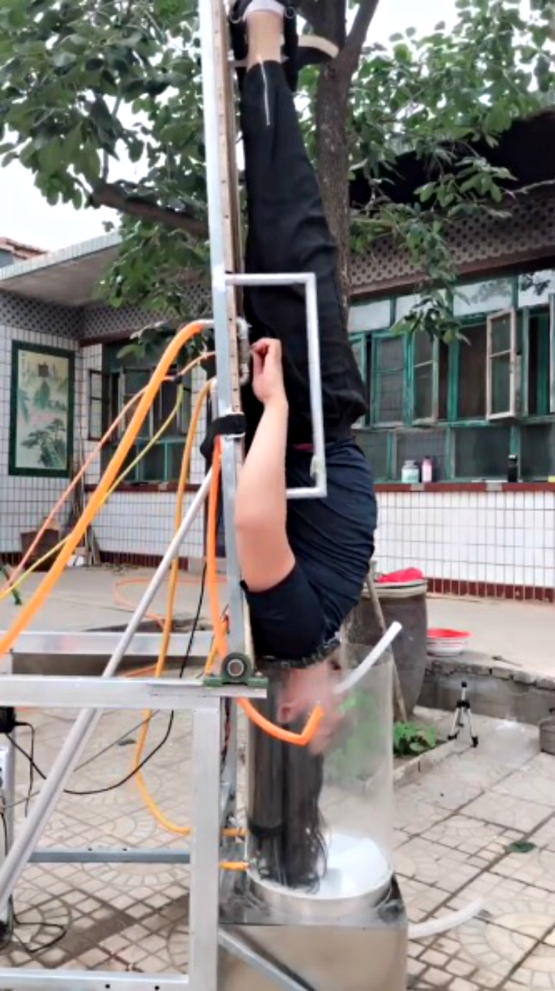 An inventor in China has gone viral on social media after creating a hair washing machine that forces users to go upside down if they actually want to see it work.