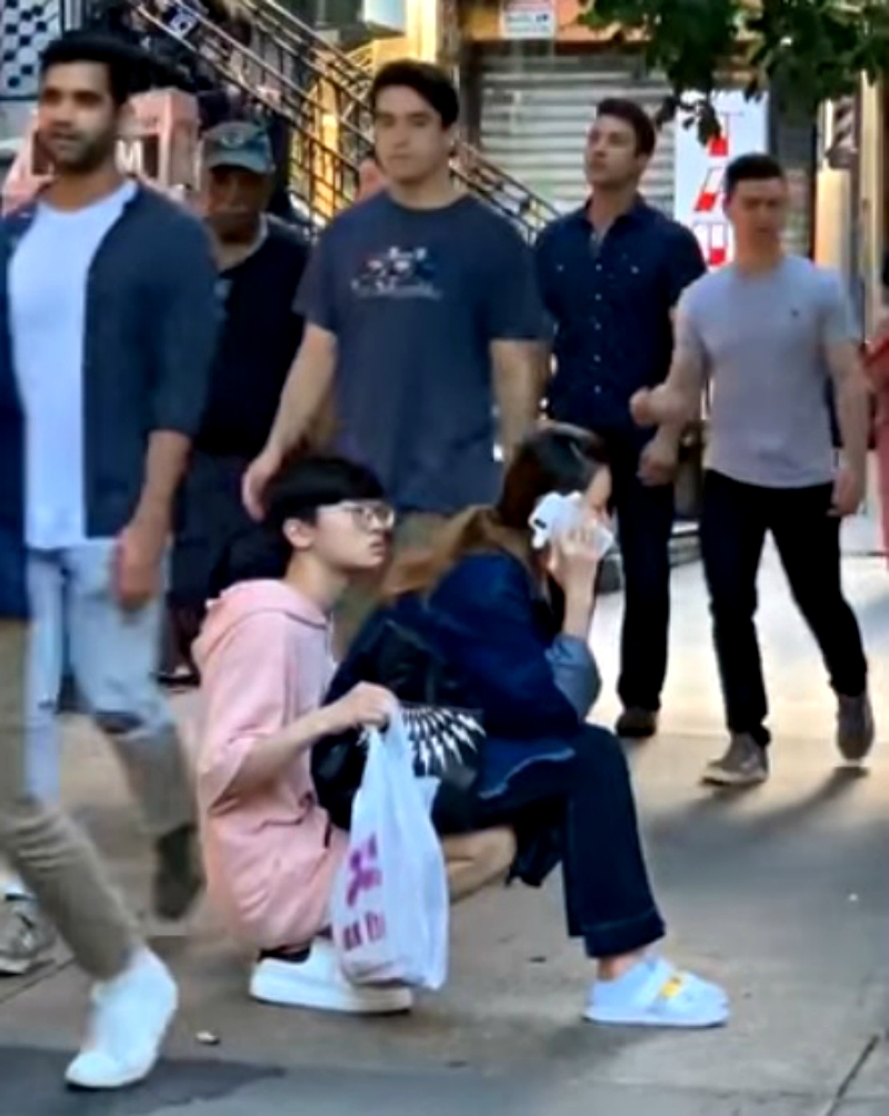 A man who turned himself into a chair for his girlfriend to sit on in public has gone viral on social media.