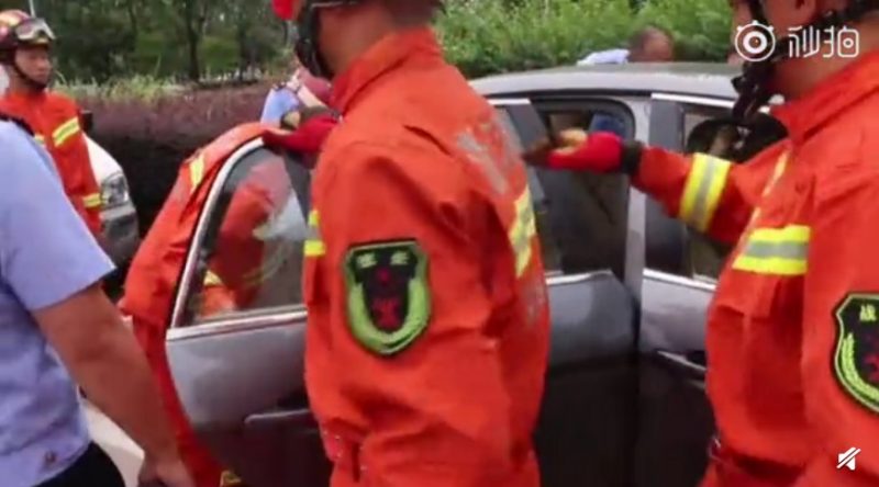 A woman in eastern China is being slammed on social media after trying to stop firefighters from breaking her car window to save her two-year-old son trapped inside the vehicle.