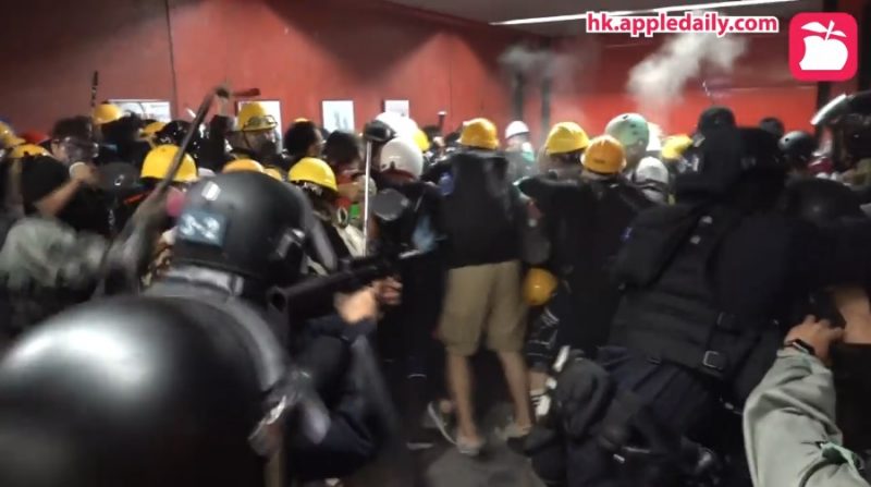 A police officer shot pepper balls point-blank at a group of protesters in Hong Kong over the weekend.