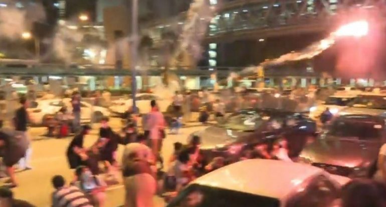 6 Injured After Fireworks are Launched From a Car At Hong Kong Protesters