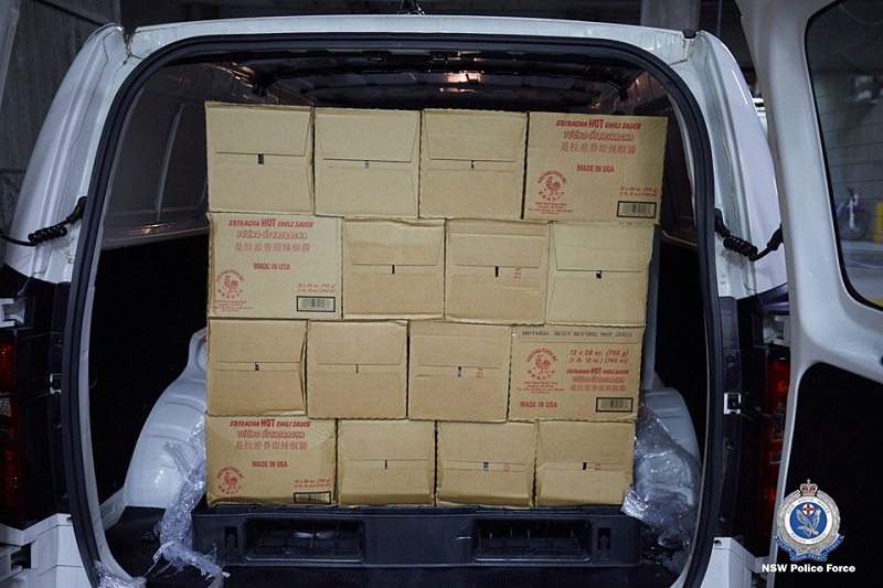 Four Australian men have been arrested for smuggling 400 kilograms (881 pounds) of methylamphetamine inside hundreds of bottles of the popular Asian hot sauce sriracha.