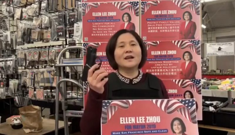 Ellen Lee Zhou, whose supporters have branded as the “Chinese Donald Trump,” sponsored the billboard showing a Black woman in a red dress and heels with her feet up, holding a cigarette in one hand and a stack of cash in the other.