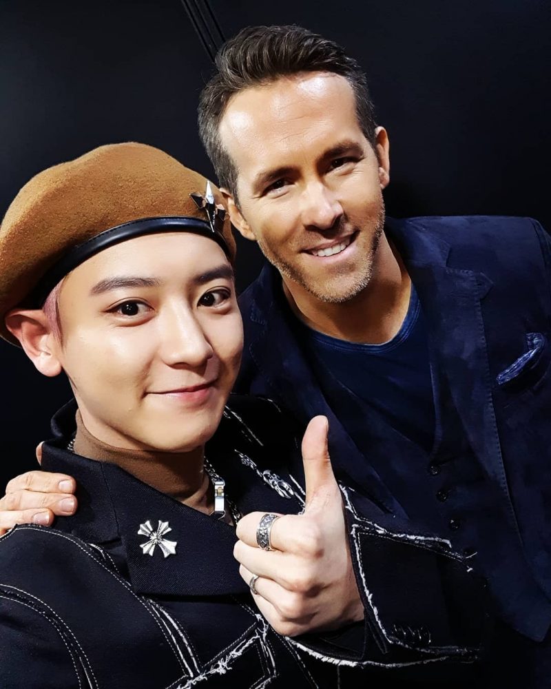 Ryan Reynolds has rubbed elbows with K-Pop group EXO this week.