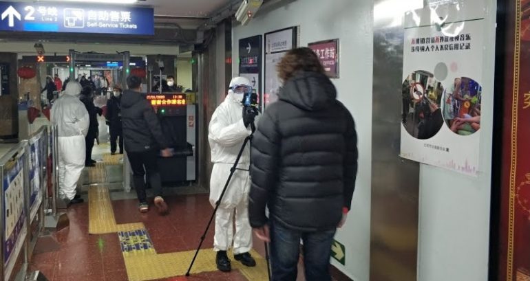 China says it can beat COVID-19 Omicron variant as world rushes to impose travel bans
