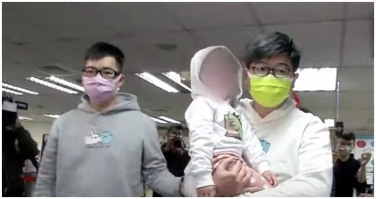 Same-sex married couple are first in Taiwan to legally adopt child