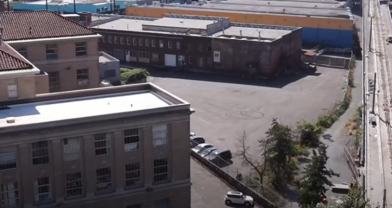 Dozens of protesters march against Seattle’s planned homeless shelter near International District