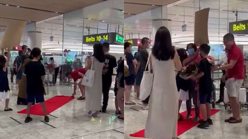 singapore family welcomes grandma with red carpet