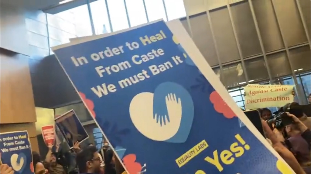 The banner of a caste discrimination ban supporter