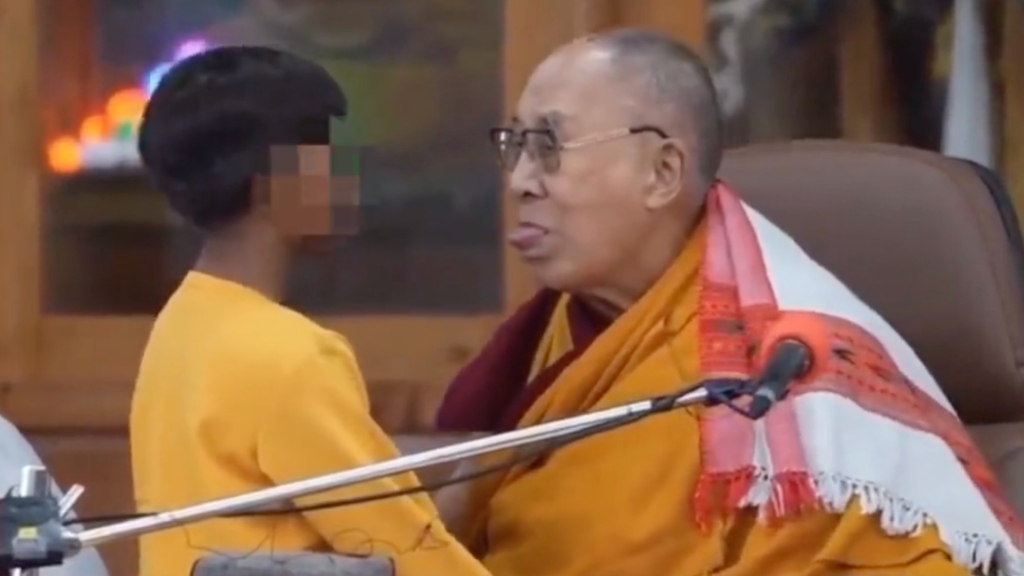 Unidentified young boy, Tenzin Gyatso