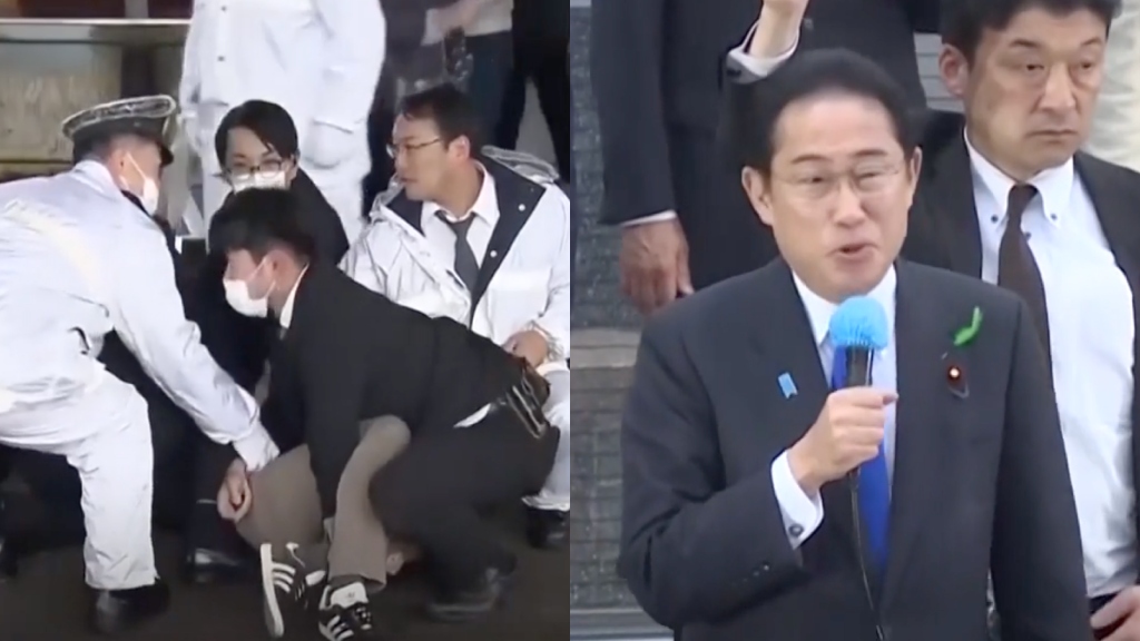Authorities holding suspect down, Fumio Kishida