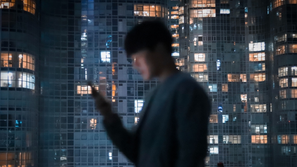 A man looking at his phone