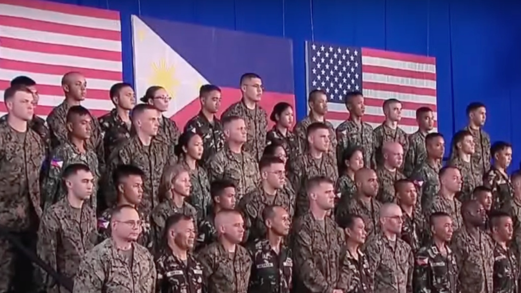 U.S. service members with Filipino WWII veterans