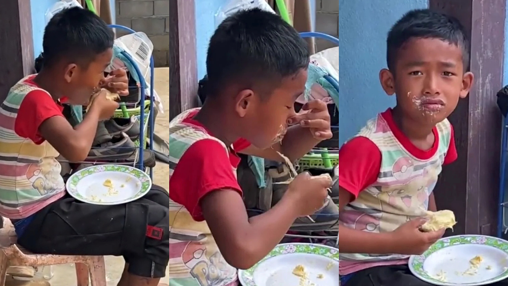 A boy eating durian