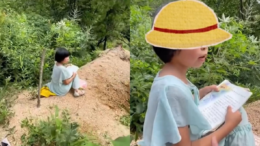Girl reading to grave