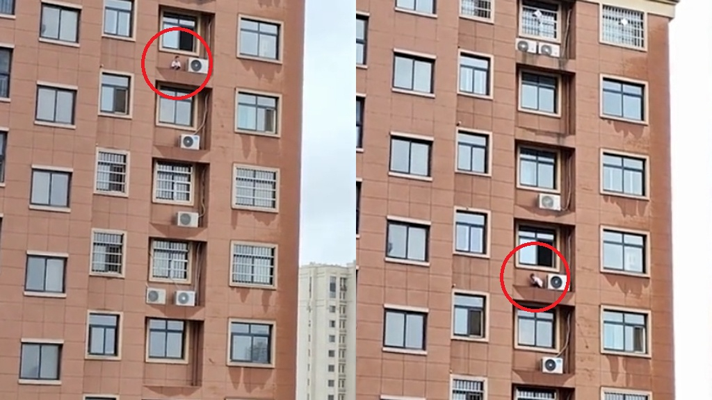 Child plays hide-and-seek on ledge of high-rise building in China in ...