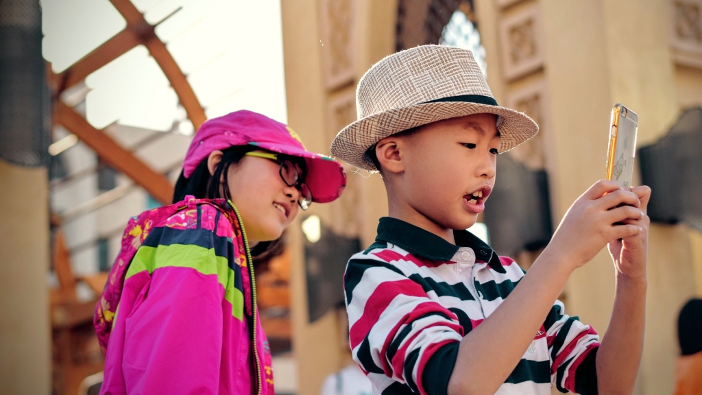 Children using a smart phone